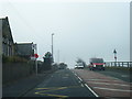 A692 at Marley Hill School, with poppy on bus stop