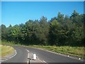 The southern entrance to Loughinisland Road from the A24