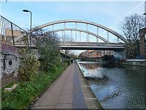 TQ3383 : Railway over canal by Robin Webster