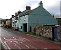 Hillside Road past a derelict pub in Llangattock