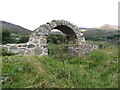 J3826 : The reconstructed chancel arch of St Mary's, Ballaghanery by Eric Jones