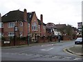 Detached houses at the western end of Manor House Drive