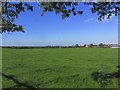 View across fields to Dove House Farm, Hough