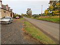 Road (A698) near the entrance to Palace Farm