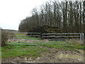 TL0781 : Pile of logs near Barnwell Wold by Richard Humphrey