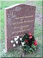 An Advent Wreath on a grave in Tring Cemetery