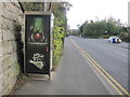 Parkgate Road, a telephone box and a bench mark