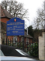 TL1314 : Our Lady of Lourdes Catholic Church sign by Geographer