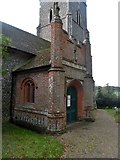 TM2348 : Brick north porch, St Mary, Great Bealing by Bikeboy