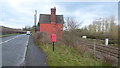 Cottage between road and railway