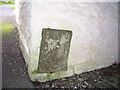 Old Gravestone in wall at Church of St Ystyffan, Llansteffan