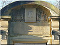 Commemorative stone on the monumental archway in Norfolk Park