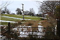 Pylon in field, on track from Pentrapeod