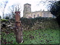 Owl carving beside Main Street (B1261), Seamer