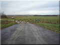 Gated farm track, West Flotmanby