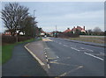 Bus stop on Muston Road (A1039)