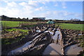 Muddy field entrance