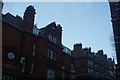 View of Stuart House and other houses on Cadogan Square from Cadogan Gardens