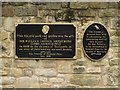 NZ2666 : Plaques on the visitor centre wall, Jesmond Dene by Graham Robson