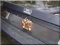 Amroth - memorial bench and fir cone wreath