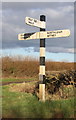 Signpost at crossroads near Common Leys Farm