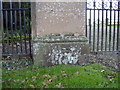 Nineteenth-century benchmark on gatepost