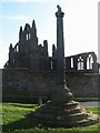 NZ9011 : Cross and abbey at Whitby by Gordon Hatton