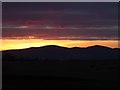 SO8848 : Sunset behind the Malvern Hills by Philip Halling