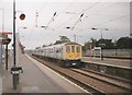 Luton train arriving at Mill Hill Broadway