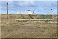 NZ3082 : Waste land behind the bund by Russel Wills
