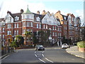 Block of mansion flats at the junction of Quex Road and West End Lane