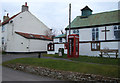 Postbox and telephone box on Main Street, Gristhorpe