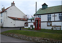 TA0881 : Postbox and telephone box on Main Street, Gristhorpe by JThomas