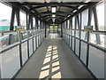 SJ3478 : The modern footbridge at Hooton railway station by John S Turner
