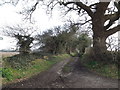 Bridleway to Lovers Lane & entrance to The Round House