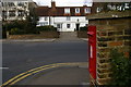 TQ2496 : Postbox at the junction of Manor Road and Wood Street, Chipping Barnet by Christopher Hilton