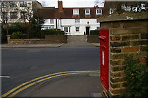 TQ2496 : Postbox at the junction of Manor Road and Wood Street, Chipping Barnet by Christopher Hilton