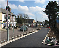 TL4657 : Devonshire Road: tarmac on the new cycle path by John Sutton