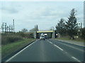 A5 northbound passing under railway bridge