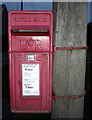 TA0583 : Elizabeth II postbox on Main Street, Cayton by JThomas