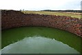 Water tank in field [2]