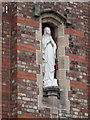 Statue set into the wall of Lourdes Hall, Rock Ferry