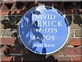 Blue plaque in Hampton Court Road