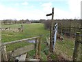 Footpath changes direction at stile