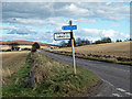 Old and new road sign