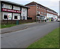 Pub and shops at the southern end of Benhall Avenue, Cheltenham 