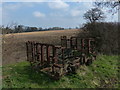 TL0393 : Old farm machinery near Woodnewton by Mat Fascione
