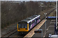 A train for Colne leaving Rose Grove Station