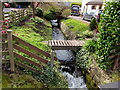 White water on a small stream below a wooden bridge, Lower Lydbrook