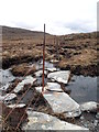 NH1898 : Remains of fence below Beinn Donuill by Chris Eilbeck